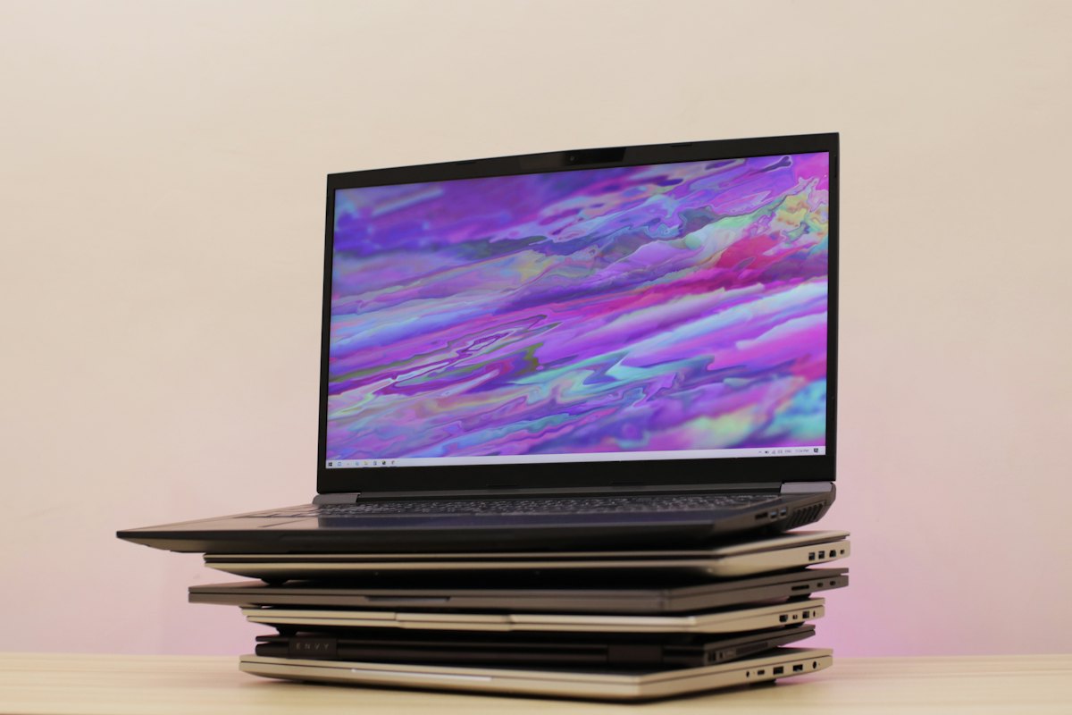 Stack of several used laptops